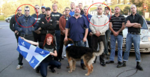 Francis Hamelin (à gauche) et Mathieu Bergeron avec des militant-e-s de 3e Voie Québec, lors d'une manifestation antisémite dans la municipalité d'Hampstead, en 2011. Au centre (avec le chien) le Major Serge Provost, de la défunte Milice patriotique du Québec. Tout au fond, avec la chemise noire, Maxime Taverna, de La Bannière Noire.