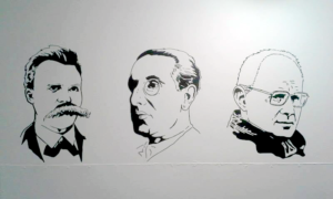Portraits de Friedrich Nietzsche, Julius Evola et Dominique Venner sur le mur de la salle d'entraînement d'Atalante, à Québec.